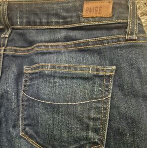 PAIGE Blue Jeans with Distressed Wash and Leather Patch